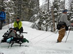 Skier pulling sled into Williams Peak Hut
